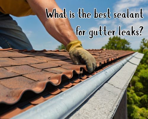 Roofer sealing roof gutter with caulk.