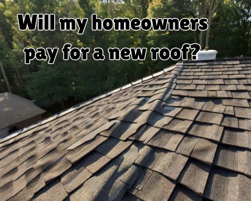 Dark gray shingles with neat edges.