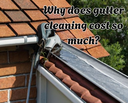 a roof gutter under cleaning maintenance