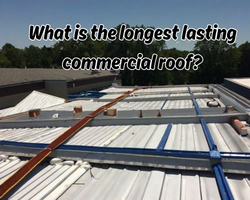 installing metal panels on a flat commercial roof.